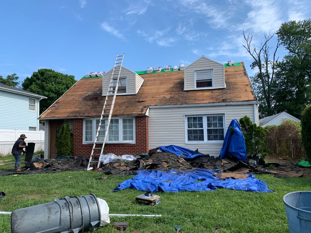 Residential roof during tear-off process