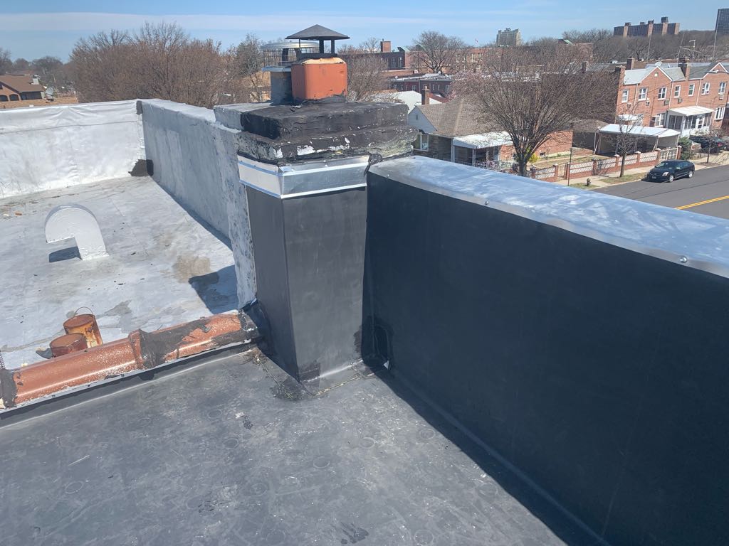 Chimney flashing and gutter tie-in